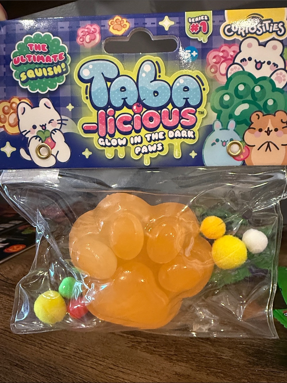 Orange Glow Paw Squishy Toy